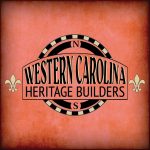 Western Carolina Heritage Builders logo in black & gold - rusty grunge style background with dark edges. Compass and fleur d lis.